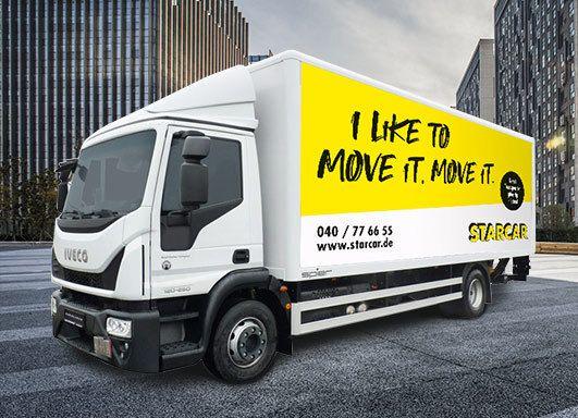 Gelber Iveco 12 Tonner mit Starcar Logo.
