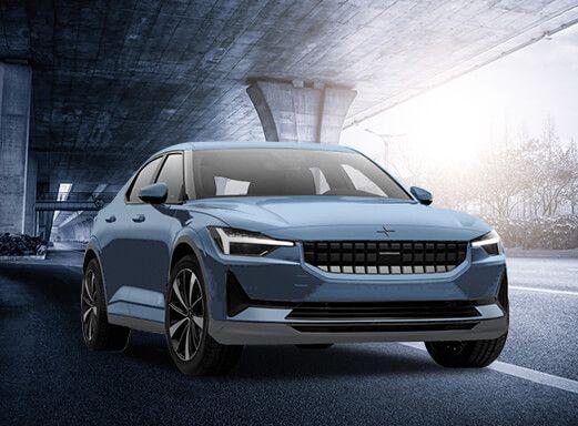 STARCAR Polestar 2, a blue electric car driving through a tunnel.